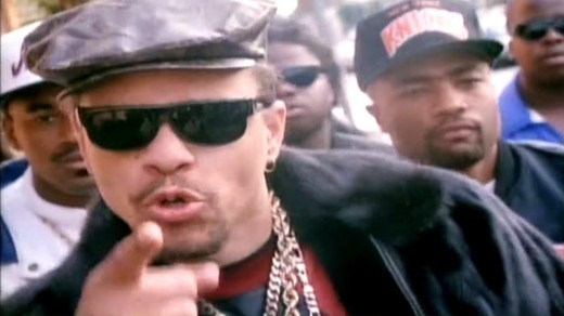 A still from the music video for New Jack Hustler showing Ice-T mugging the camera.